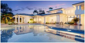 A large pool with a house in the background