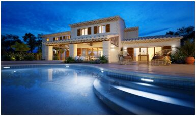 A large house with a pool in the middle of it