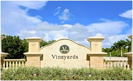 A sign that says vineyards on it.